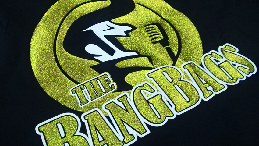 Referenz: Hemden veredelt mit glitzerndem und goldenen Transferdruck für die Band "The BangBags"